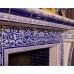 Открытая топка в облицовке расписными изразцами под гжель производитель Ceramica